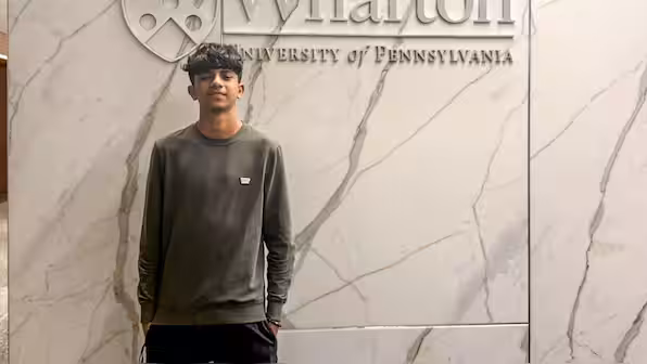 17-year-old UAE student entrepreneur Nirmay Teckchandani stands at Wharton, University of Pennsylvania